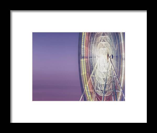 Scenics Framed Print featuring the photograph Illuminated Motion Ferris Wheel At by Aaaaimages