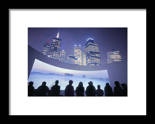 Scenics Framed Print featuring the photograph Illuminated skyline with outdoor cinema, showing beautiful landscape by EschCollection