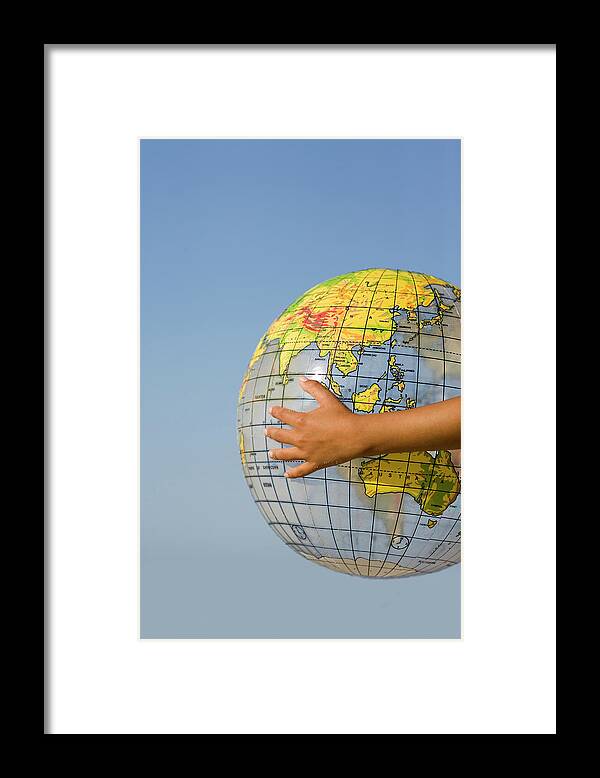Inflatable Globe Framed Print featuring the photograph Inflated Globe by Ian Hooton/science Photo Library