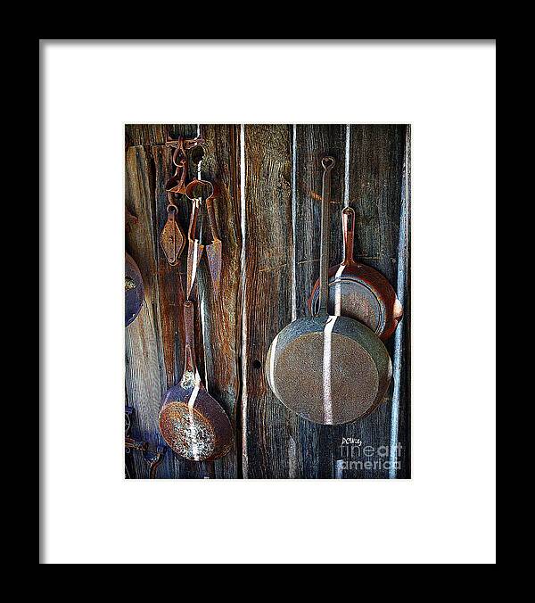 Iron Skillets Framed Print featuring the photograph Iron Skillets by Patrick Witz