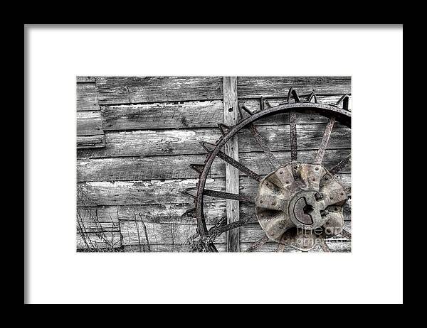 Coosaw Framed Print featuring the photograph Iron Tractor Wheel by Scott Hansen
