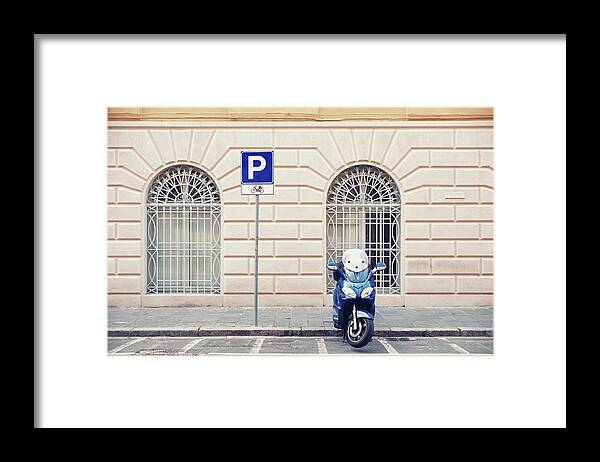 Sparse Framed Print featuring the photograph Italian Scooter Parked On The Street by Marcoventuriniautieri