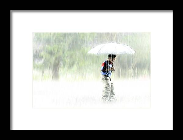 Children Framed Print featuring the photograph It's Raining Outside by Heiko Koehrer-Wagner