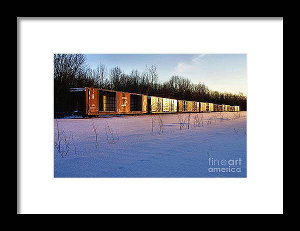 Landscape Framed Print featuring the photograph January Sunset on Boxcars Ill by Brett Maniscalco