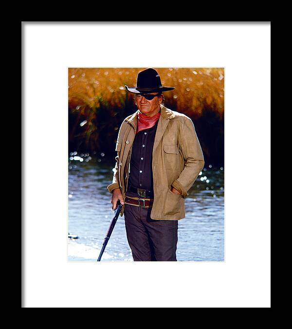 Rooster Cogburn Framed Print featuring the photograph John Wayne in Rooster Cogburn by Silver Screen