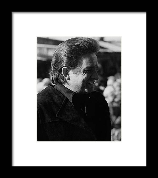 Johnny Cash Smiling Old Tucson Az Black And White Framed Print featuring the photograph Johnny Cash smiling Old Tucson Arizona 1971 by David Lee Guss