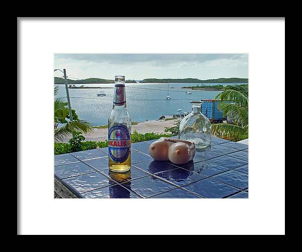 Duane Mccullough Framed Print featuring the photograph Kalik Beer Bottle at the Front Porch by Duane McCullough