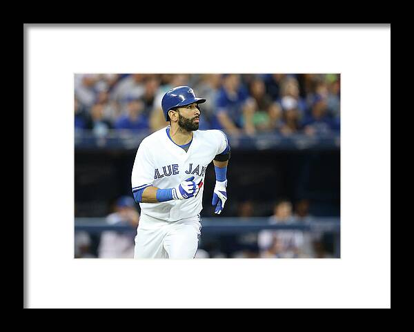 American League Baseball Framed Print featuring the photograph Kansas City Royals V Toronto Blue Jays by Tom Szczerbowski