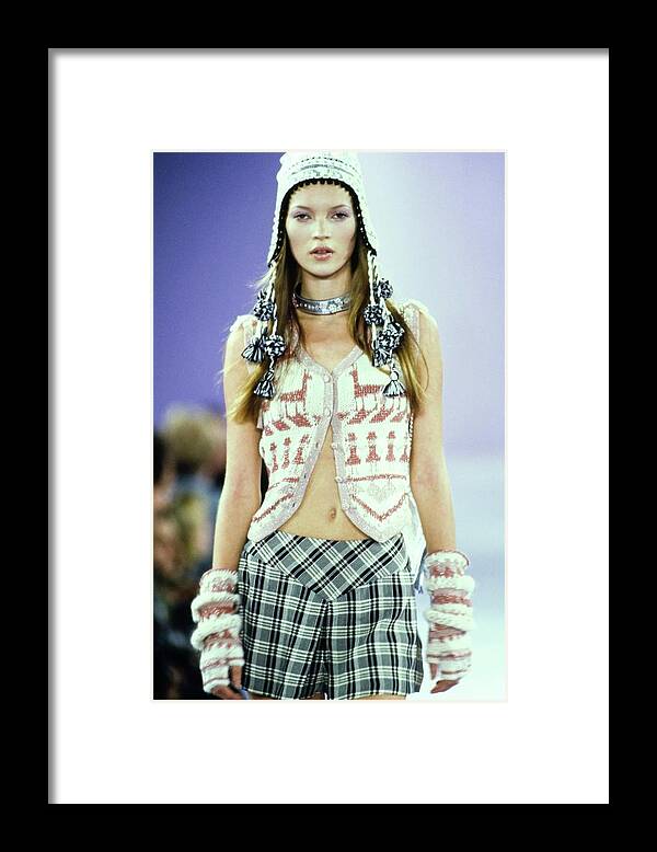 Fashion Model Framed Print featuring the photograph Kate Moss On The Runway For Anna Sui Spring 1994 by Guy Marineau
