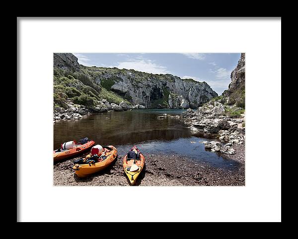 Blue Framed Print featuring the photograph Kayak time - The Landscape of Cales Coves Menorca is a great place for peace and sport by Pedro Cardona Llambias
