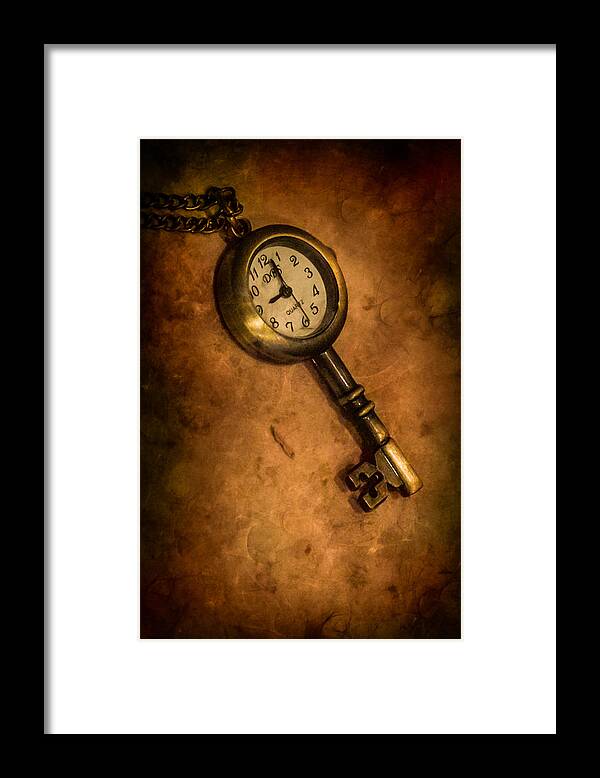 Time Framed Print featuring the photograph Key to Eternity by Elvira Pinkhas