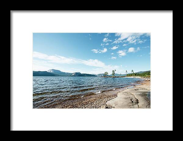 Tranquility Framed Print featuring the photograph Lakeshore In Norway by Hannah Bichay