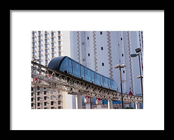 America Framed Print featuring the photograph Las Vegas Monorail And Excalibur Hotel by Mark Williamson/science Photo Library