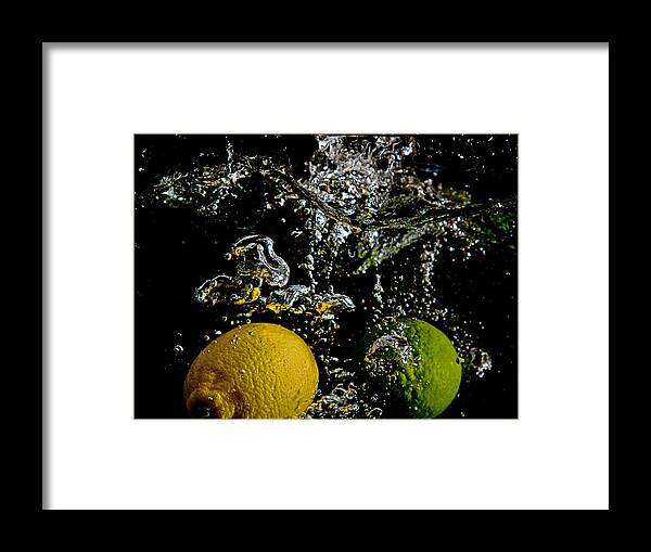 Lemon Framed Print featuring the digital art Lemon and Lime Splash by John Hoey
