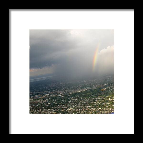 Dark Clouds Framed Print featuring the photograph Light in the darkness by Sue Morris