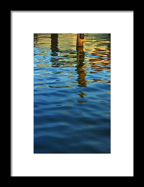 Reflections Framed Print featuring the photograph Light Reflections on the Water by a Dock at Aransas Pass by Randall Nyhof