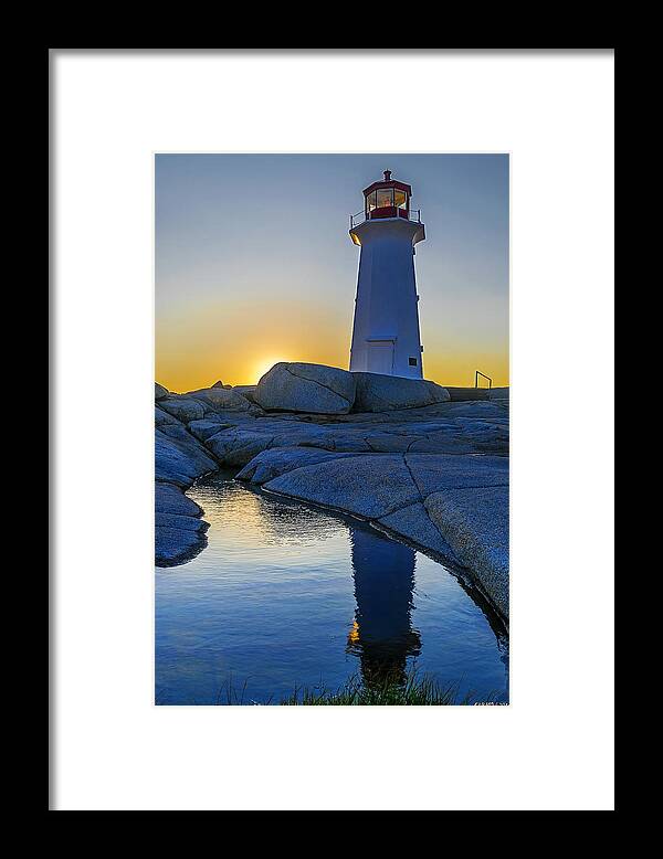 Peggys Cove Framed Print featuring the photograph Lighthouse at Sunset by Ken Morris