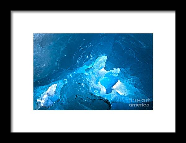 Winter Framed Print featuring the photograph Lighting in nigardsbreen glacier grotto 3 by Heiko Koehrer-Wagner