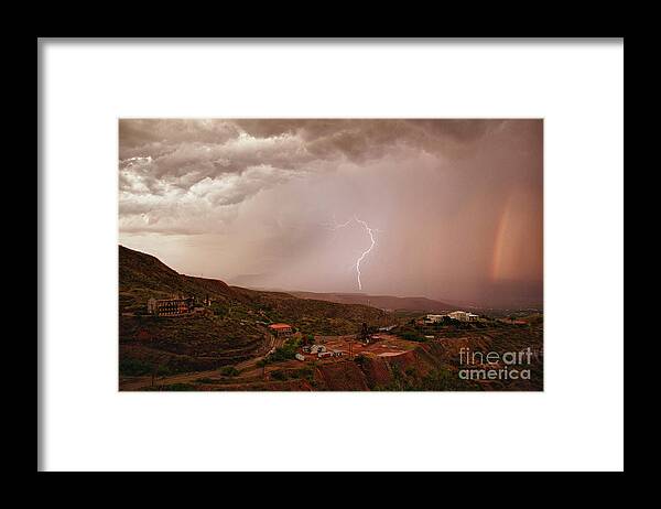Lightning Framed Print featuring the photograph Lightning and a Rainbow by Ron Chilston