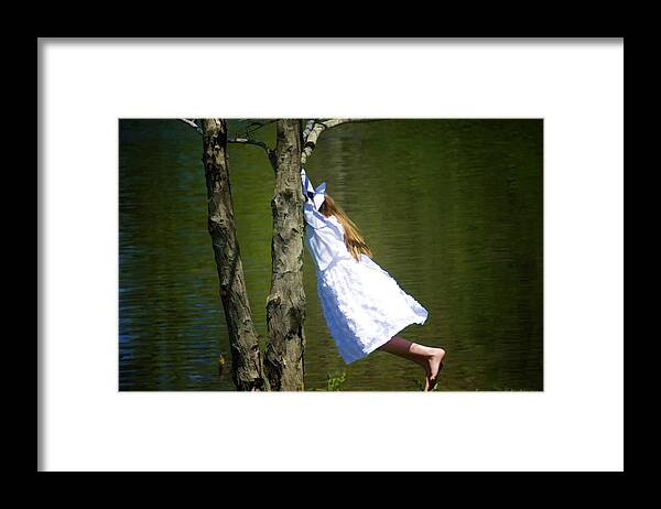 Girl Framed Print featuring the photograph Litte Girl Swinging in White Dress by Donna Doherty