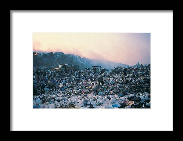 People Framed Print featuring the photograph Living from waste on Smokey Mountain,Manila,Philippines by Stockbyte