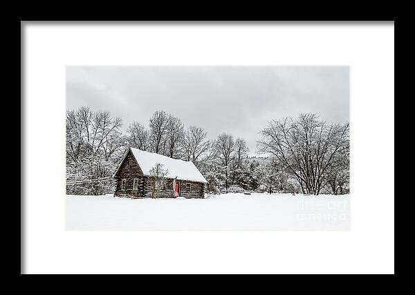 Cabin Framed Print featuring the photograph Log cabin in the snow by Edward Fielding