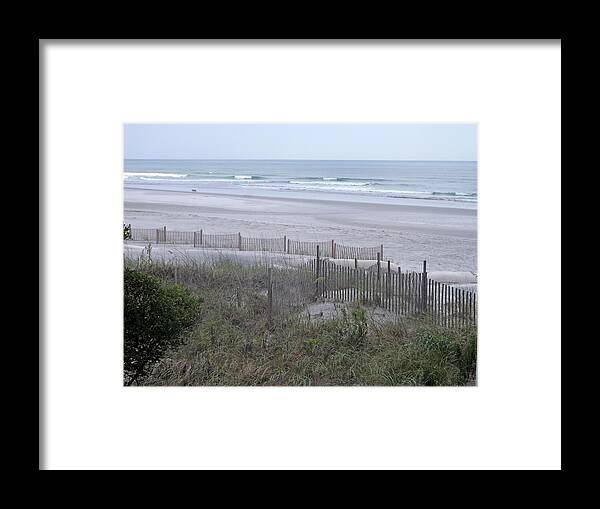 Background Framed Print featuring the photograph Lone Beach Walker by Bill TALICH
