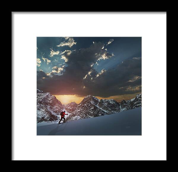 Scenics Framed Print featuring the photograph Lone Climber On A Snowy Slope At Sunrise by Buena Vista Images
