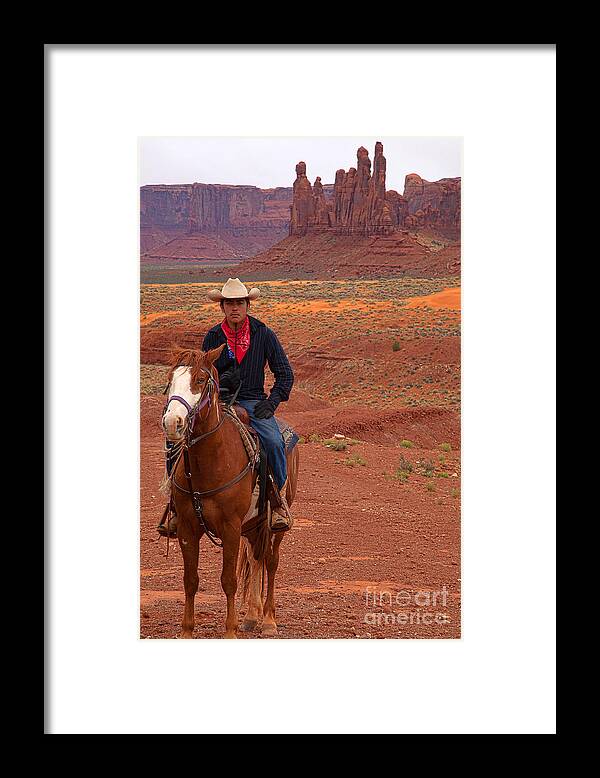 Red Soil Framed Print featuring the photograph Lone Rider by Jim Garrison