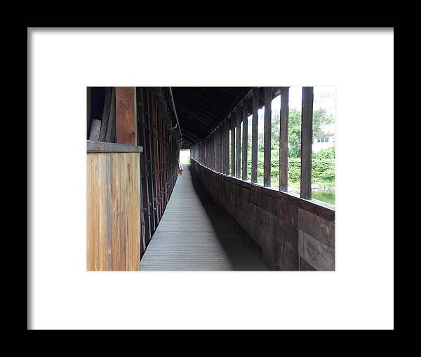 Covered Bridge Framed Print featuring the photograph Long walkway in Covered Bridge by Catherine Gagne