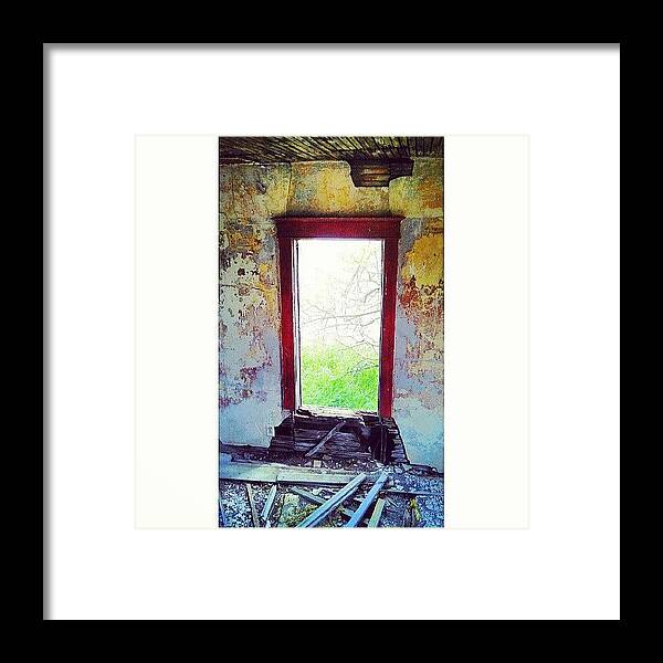 Red Framed Print featuring the photograph Looking Through Time by Aaron Kremer