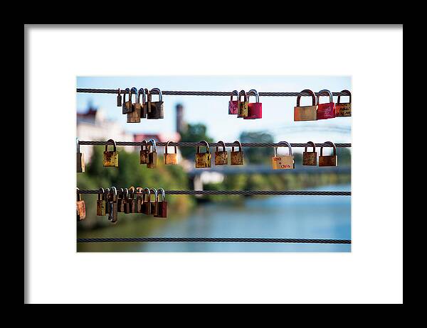 Hanging Framed Print featuring the photograph Love Locks Hang From Kettenbrücke by Holger Leue