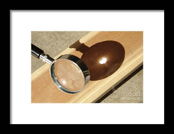 Magnifying Glass Focusing Sun Light Framed Print by GIPhotoStock - Fine Art  America