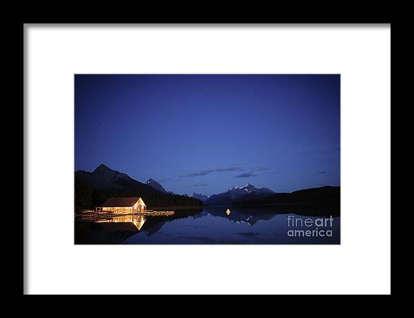 Stars Framed Print featuring the photograph Maligne Lake Boathouse at Night by Dan Jurak