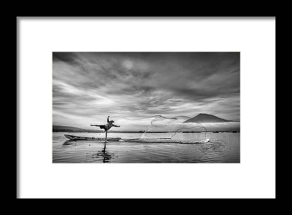 Fisherman Framed Print featuring the photograph Man Behind The Nets by Arief Siswandhono