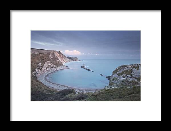 Tranquility Framed Print featuring the photograph Man Of War Cove In Dorset by Julian Elliott Photography