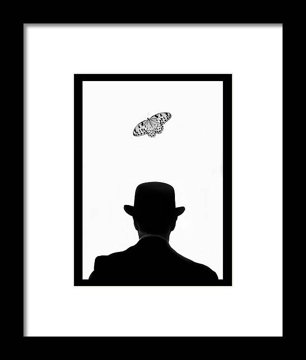 Mature Adult Framed Print featuring the photograph Man Standing Under Butterfly by Grant Faint