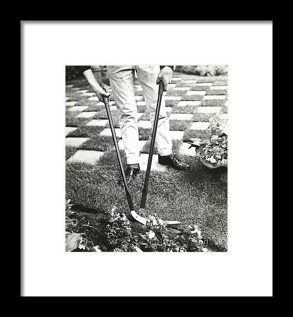 Exterior Framed Print featuring the photograph Man Using Turf Trimmers by Pedro E. Guerrero