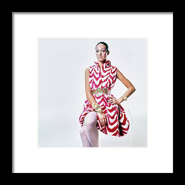 Fashion Framed Print featuring the photograph Marisa Berenson Wearing A Mink Dress by Bert Stern