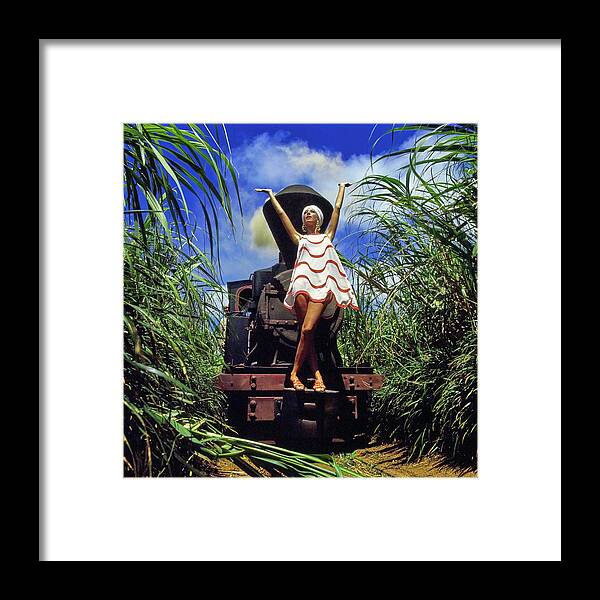 Fashion Framed Print featuring the photograph Marisa Berenson Wearing A Striped Dress by Arnaud de Rosnay