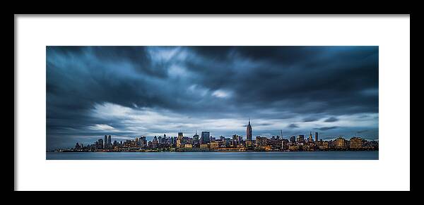 Manhattan Framed Print featuring the photograph Menacing Sky Over Manhattan by Chris Halford