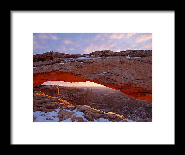 Mesa Arch Framed Print featuring the photograph Mesa Glow by Emily Dickey