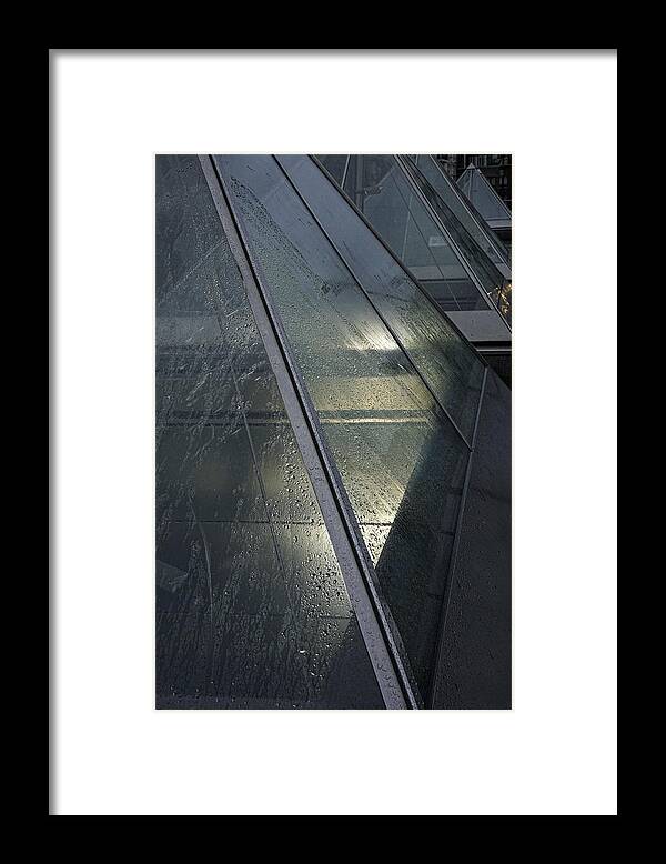 Metro Pyramids Framed Print featuring the photograph Metro Pyramids in the rain by Inge Riis McDonald