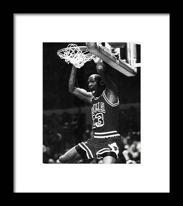 Michael Jordan Dunks Framed Print by Retro Images Archive - Pixels