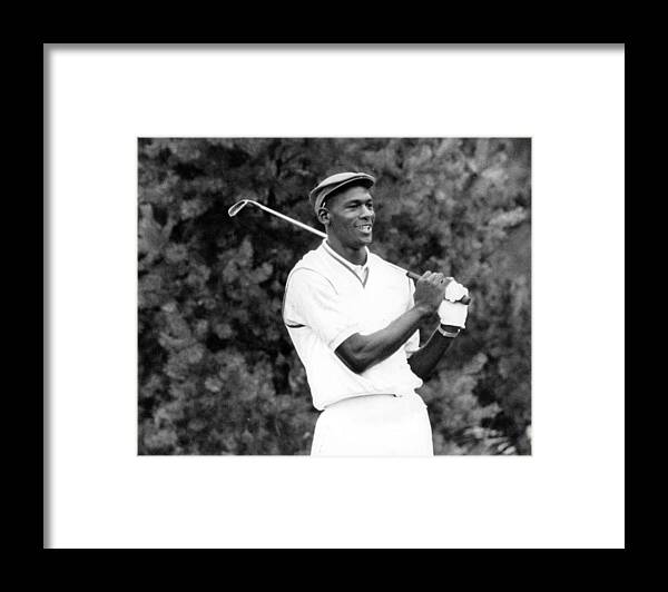 Classic Framed Print featuring the photograph Michael Jordan Playing Golf by Retro Images Archive