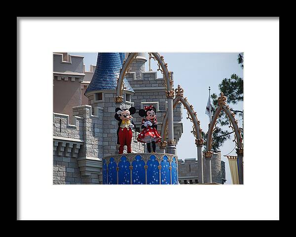 Magic Kingdom Framed Print featuring the photograph Mickey And Minnie In Living Color by Rob Hans