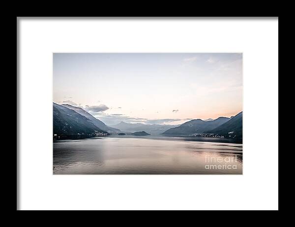 Europa Framed Print featuring the photograph mist between the mountains dusk at Lake Como Italy by Peter Noyce