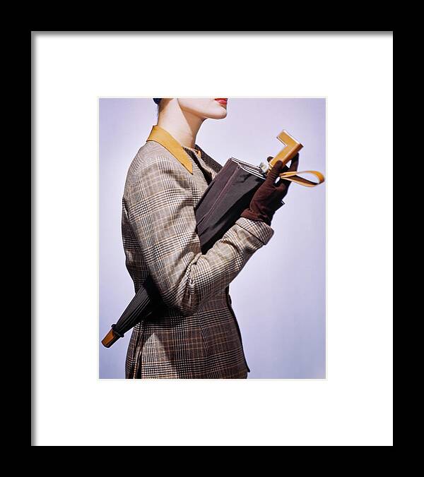 Accessories Framed Print featuring the photograph Model In A Plaid Suit Holding A Lesco Rayon by Fredrich Baker