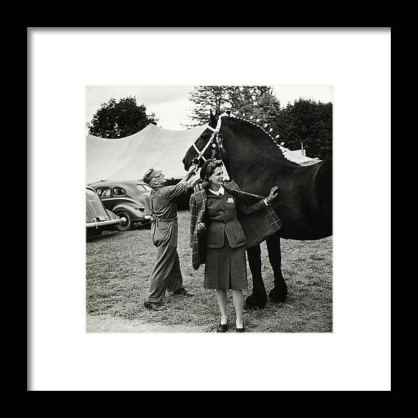 Animal Framed Print featuring the photograph Model In Tweed Suit With Horse And Trainer by Toni Frissell