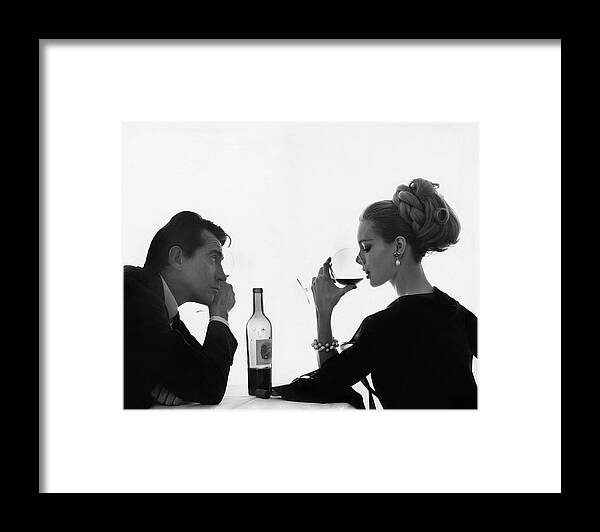 #faatoppicks Framed Print featuring the photograph Man Gazing at Woman Sipping Wine by Bert Stern